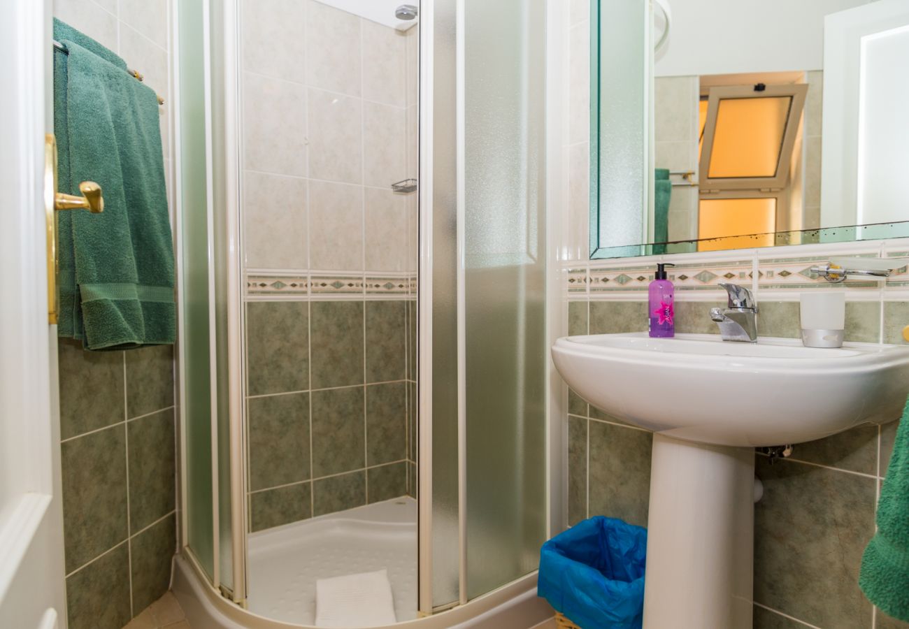 shower, wash basin, mirror, towel