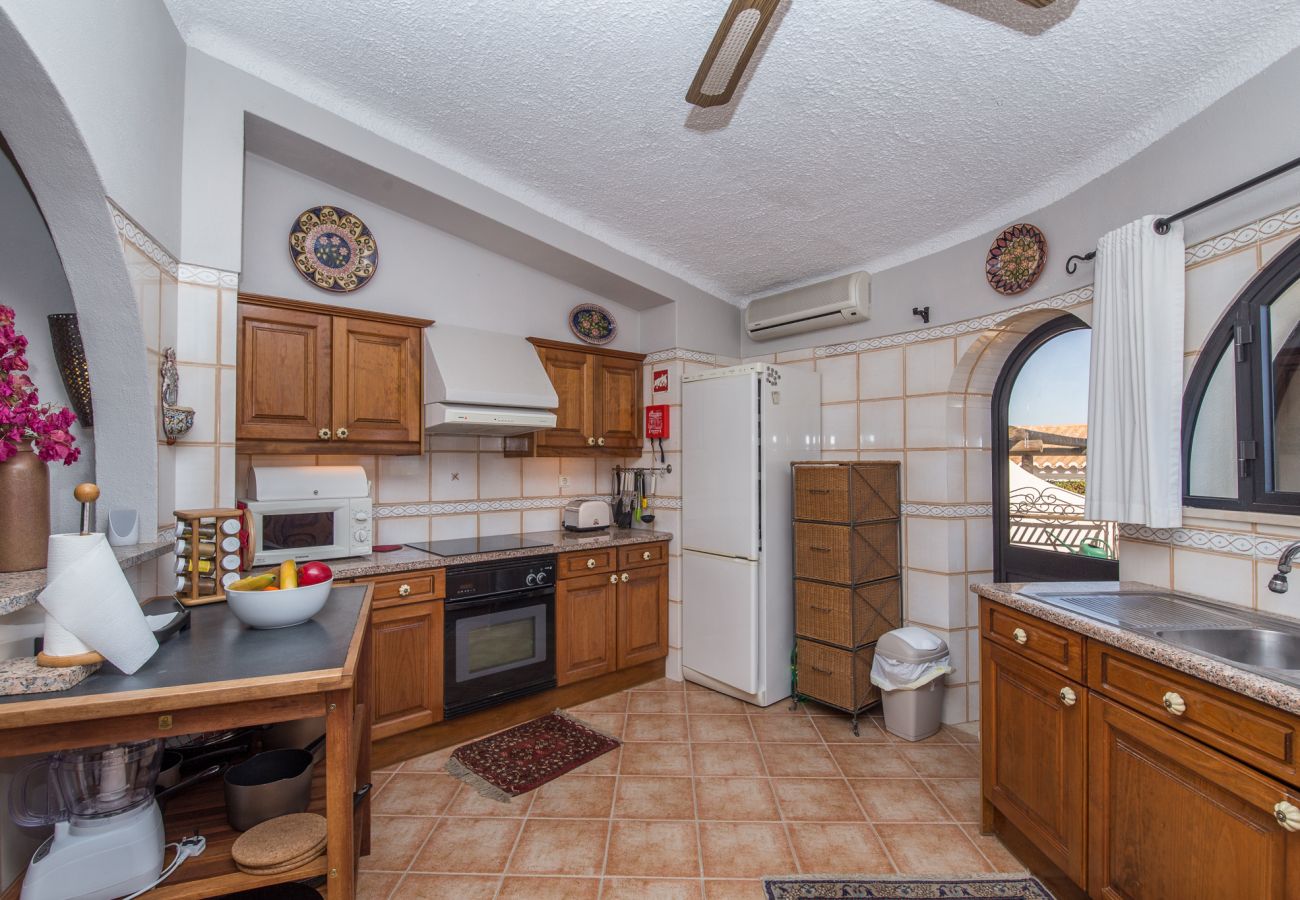 kitchen hob and oven plenty of work space and back door