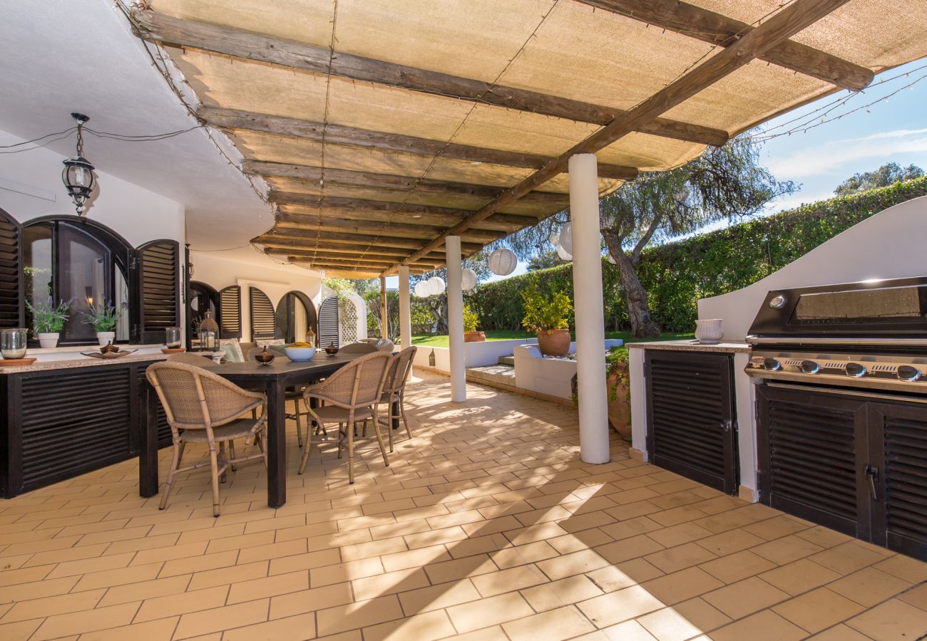 outside dining area with gas barbecue