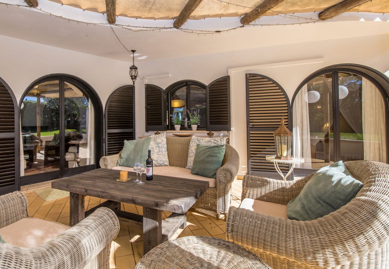 Comfortable seating area on shaded terrace
