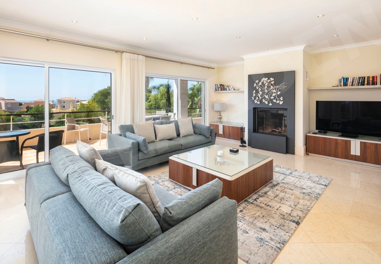 Modern living room with terrace access and sea views at Villa Eden in Carvoeiro
