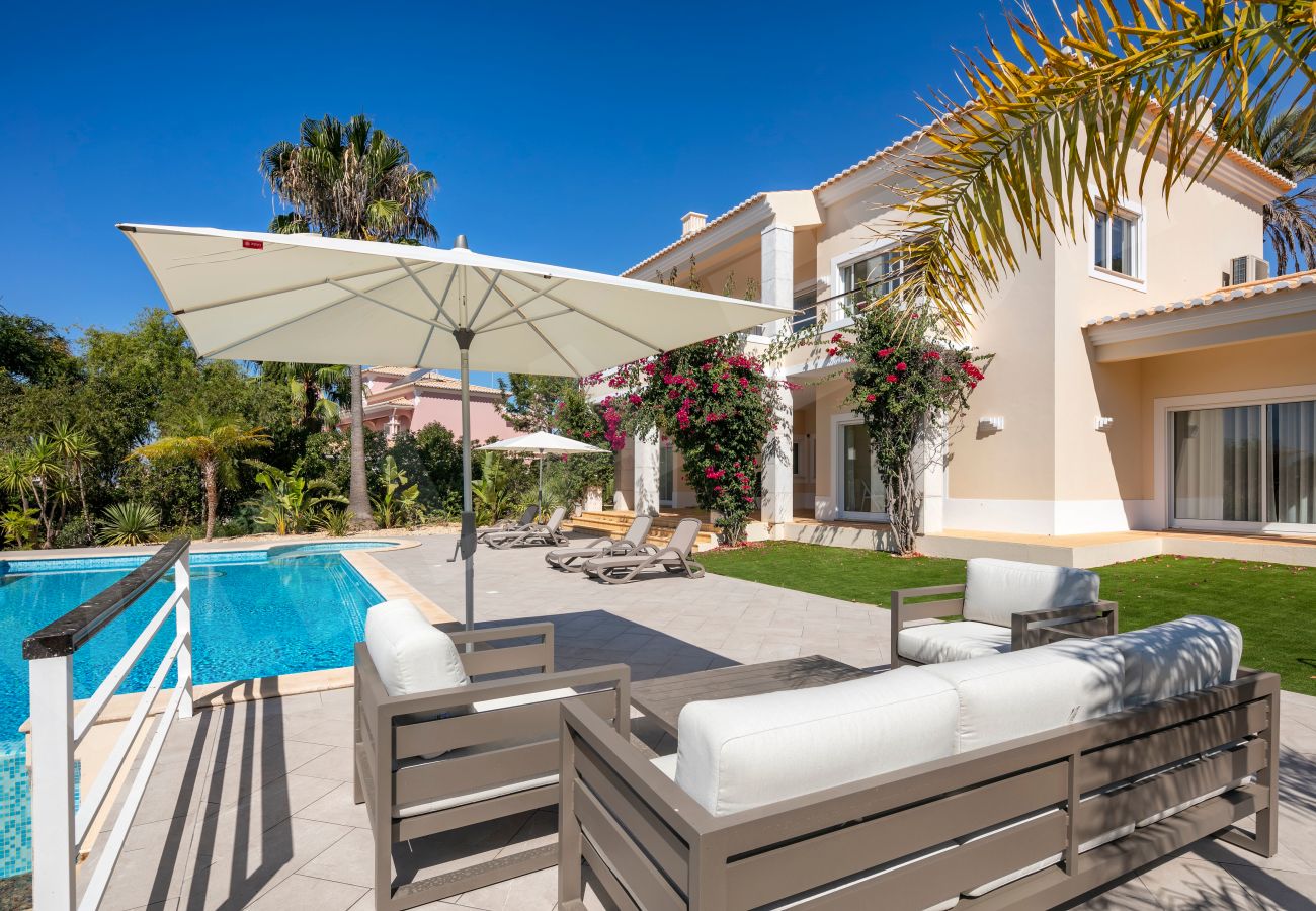 Private pool and modern outdoor lounge at Villa Eden in Carvoeiro, Algarve